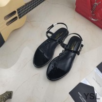 Saint Laurent Cassandra Flat Sandals With T-Strap In Patent Leather Black